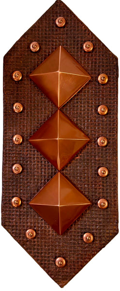 Decorative browns culpture with geometric patterns and bronze studs 