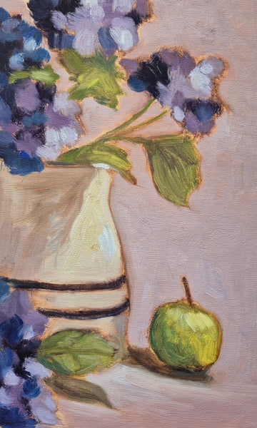Painting of a vase with purple flowers and green apple.