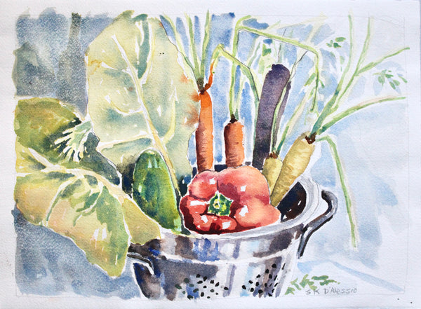 Watercolor painting of vegetables in a colander on a light blue background