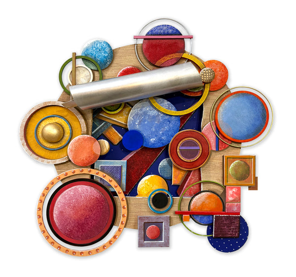 A colorful abstract painted construction of geometric shapes, circles, squares, and textured elements arranged on a light wood background, isolated on a white backdrop.