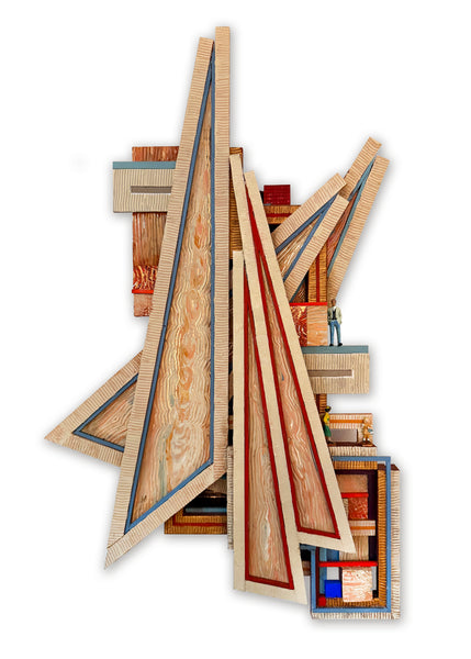 An abstract geometric wall art sculpture made of layered wood panels, triangles, and stacked rectangular blocks in natural wood tones with red, blue, and brown inlay accents, shown on a plain white background.