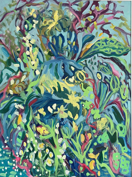 Colorful garden scene with various plants and flowers.