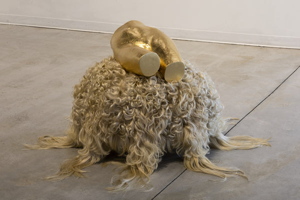 Vanity Series: "Beauty is only the promise of happiness." Stendhal, directly modeled plaster pelvis, composition gold leaf, plywood, upholstery, and human and synthetic hair sculpture by Philadelphia artist Laura Frazure