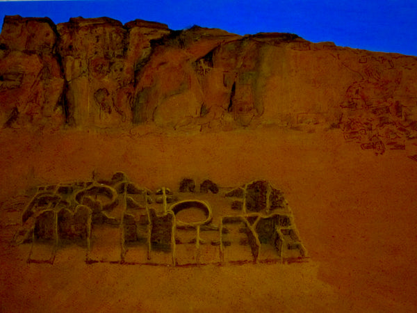 Rock formation with 'ancient building remnants against a blue sky