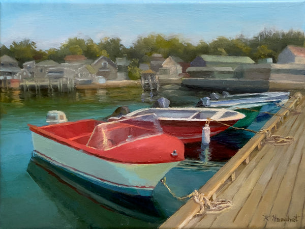 An oil painting of red and white motorboats moored at a wooden dock, with a harbor village and trees in the background under a blue sky.