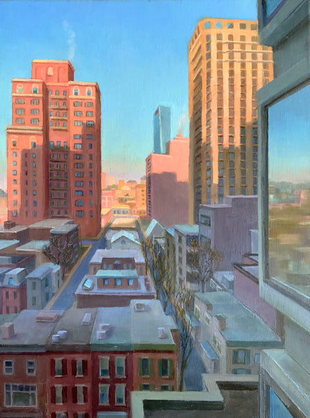 Cityscape with tall buildings and a clear blue sky
