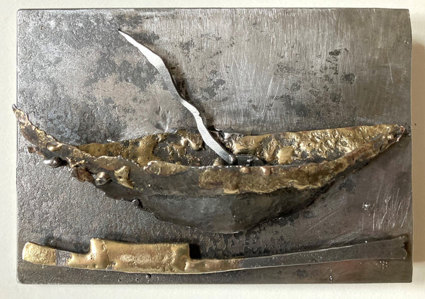 Abstract metal relief sculpture of a boat with an oar beneath.
