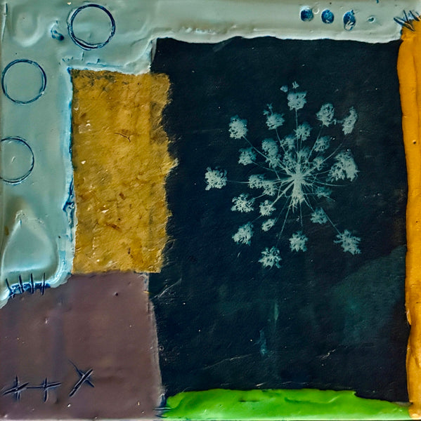 Mixed media collage with various textures and patterns on a dark background