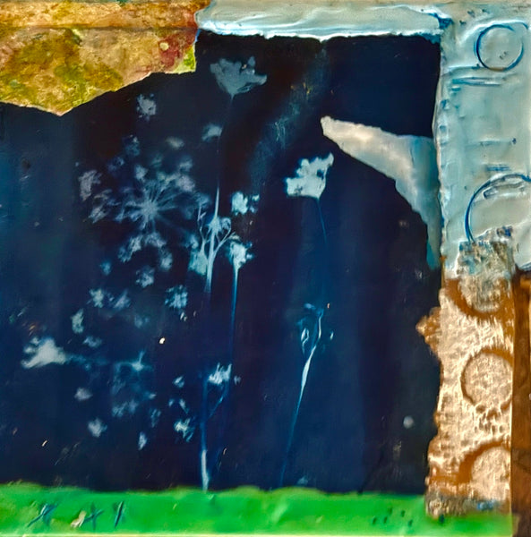 Abstract artwork with blue and white patterns on a textured surface