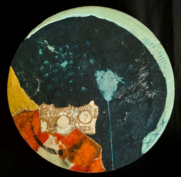 Abstract artwork with a central dandelion-like figure on a dark background