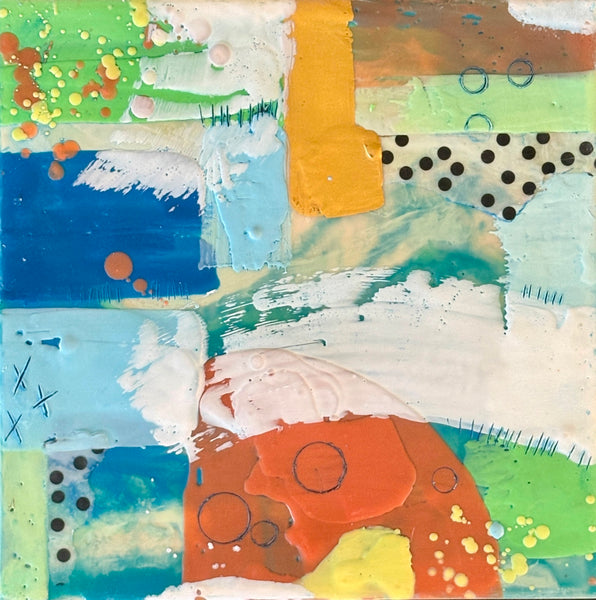 Abstract mixed media collage with a variety of colors and textures
