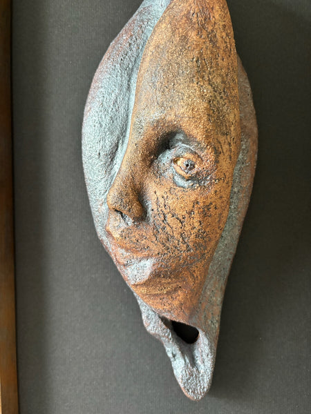 Teardrop, terracotta relief sculpture with glazes and underglazes by Cerulean Arts Collective Member Andrea Lyons