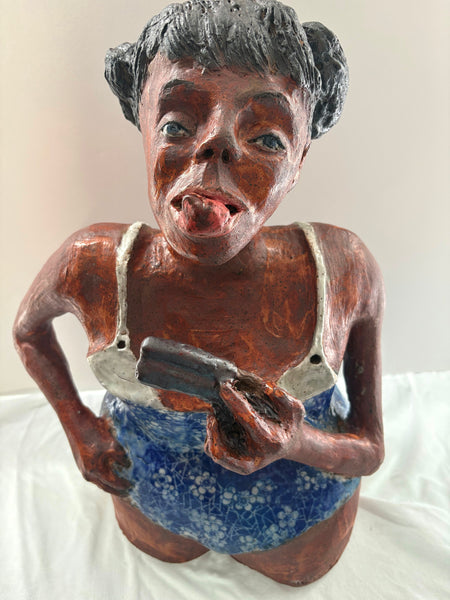 Sculpture of a girl holding a fudgicle with a white background