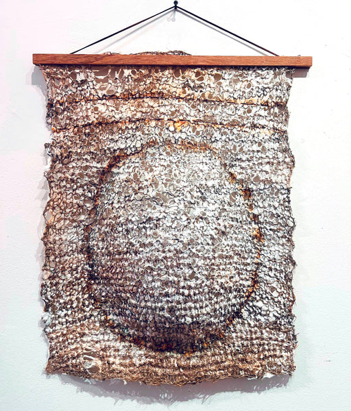 Belly, paper pulp, knit twine and wood sculpture by Cerulean Arts Collective Member Anne Marble. 