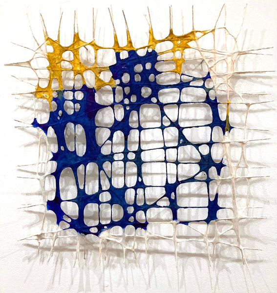 Criss Cross, paper pulp, pigment and string sculpture by Cerulean Arts Collective Member Anne Marble.  