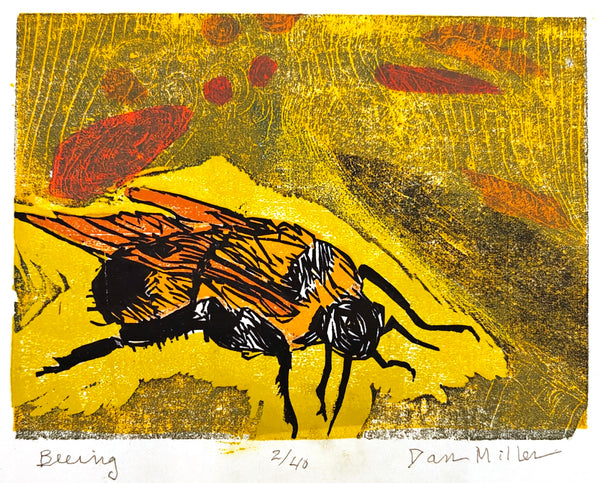 Woodcut print of a bee with a bright yellow and red textured background.