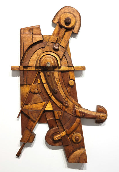 Wooden abstract sculpture on a white background