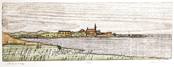 Scenic woodcut print of a village with buildings and landscape overlooking water.