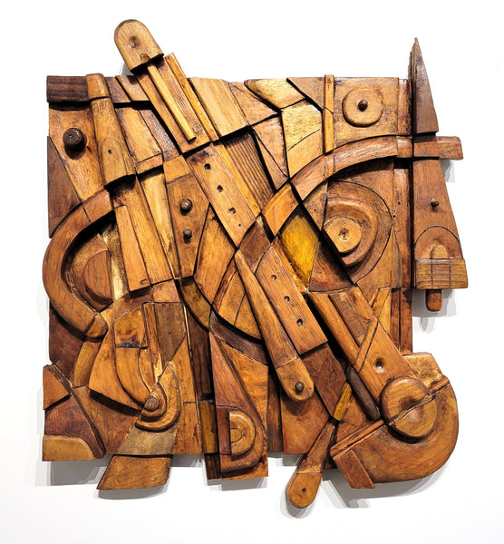 Wooden abstract sculpture on a white background