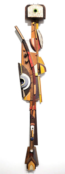 Abstract wooden sculpture with geometric shapes on a white background