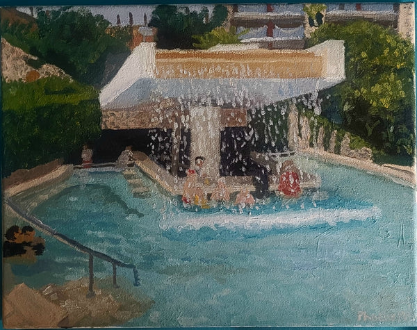 Fountain with water features in a garden setting