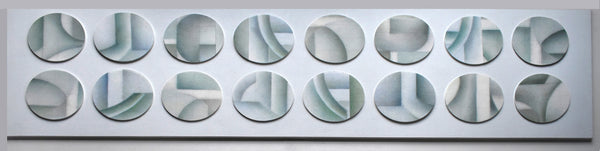 Decorative wall art with circular designs on a gray background