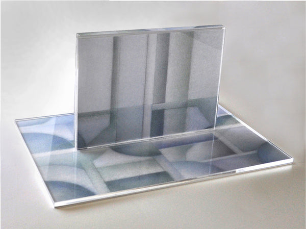 Sculpture of digital prints of drawings and clear acrylic plates.