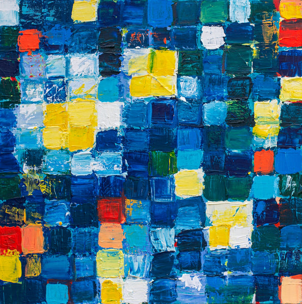 Abstract art piece with a grid of colorful squares in blue, yellow, red, and green.
