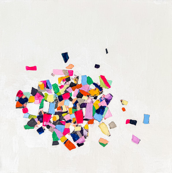 Abstract canvas art featuring a cluster of colorful painted fragments in pink, blue, green, yellow, orange, and black on a textured off-white background.