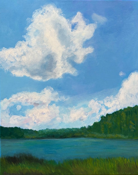 Painting of a landscape with a lake, trees, and fluffy clouds in a blue sky.