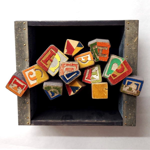 Scrambled, mixed media wall sculpture by Pennsylvania artist Gene Shaw