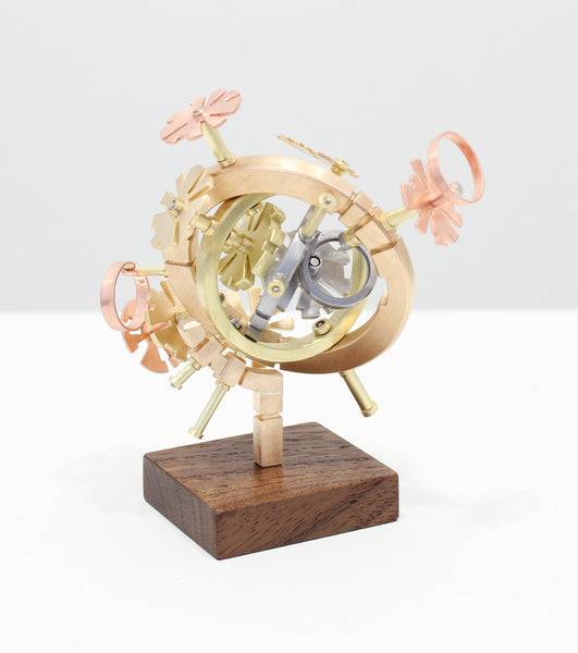 AstroObject [1c.x0], copper, brass, bronze, steel, aluminum and walnut sculpture by Philadelphia artist Kathleen Studebaker available at Cerulean Arts.
