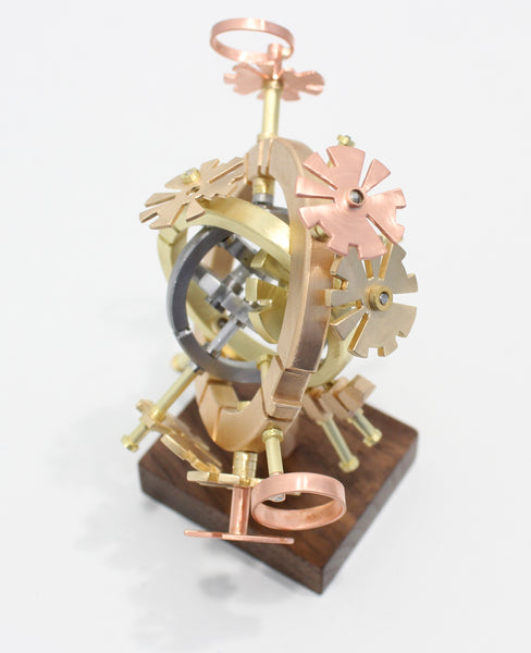 AstroObject [1c.x0], copper, brass, bronze, steel, aluminum and walnut sculpture by Philadelphia artist Kathleen Studebaker available at Cerulean Arts.