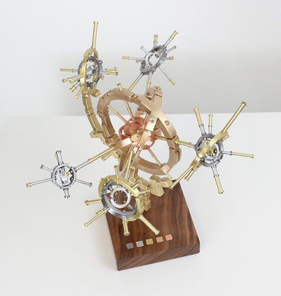 AstroObject [2f.x1], copper, brass, bronze, steel, aluminum and walnut sculpture by Philadelphia artist Kathleen Studebaker available at Cerulean Arts. 