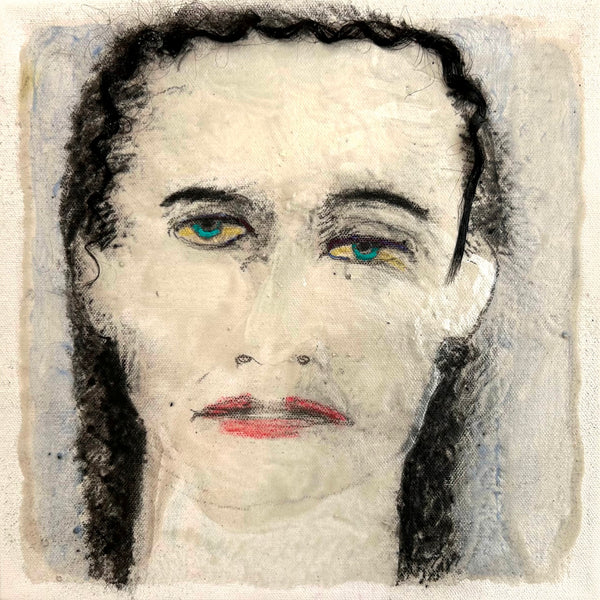 Marble dust and charcoal depiction of a face with stylized features on a textured background