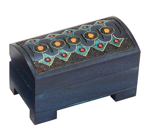 Carved wood chest with blue stain and decorative lid.