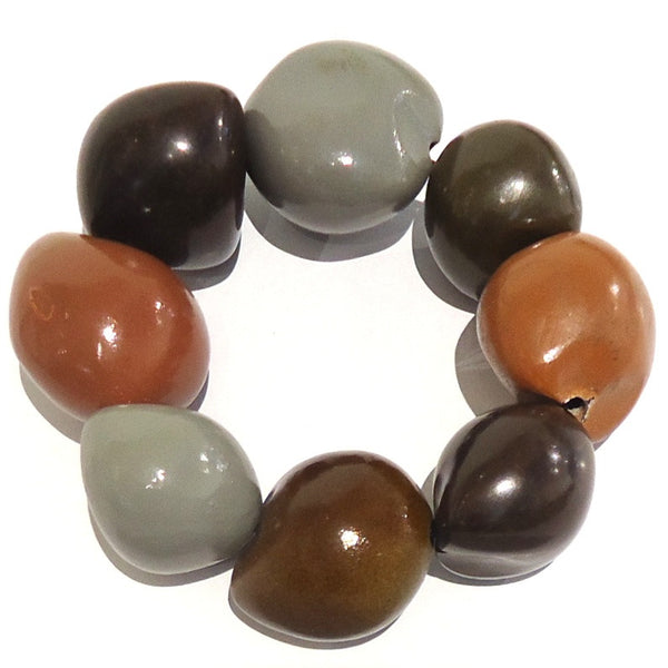 Kukui nut bracelet with beads made from the dried palm tree nut available at Cerulean Arts