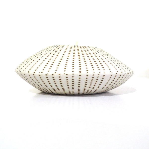 Seashell inspired porcelain tea light candle holder in white with stippled brown stripes available at Cerulean Arts.