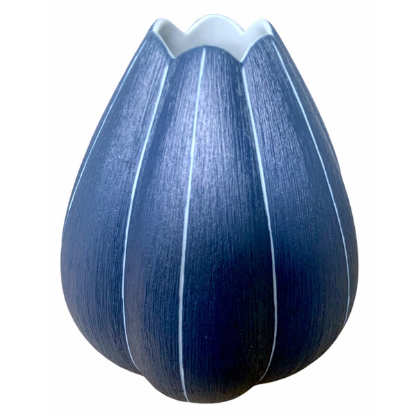 Tulip-shaped porcelain vase with raked design in navy blue and white stripe available at Cerulean Arts.  