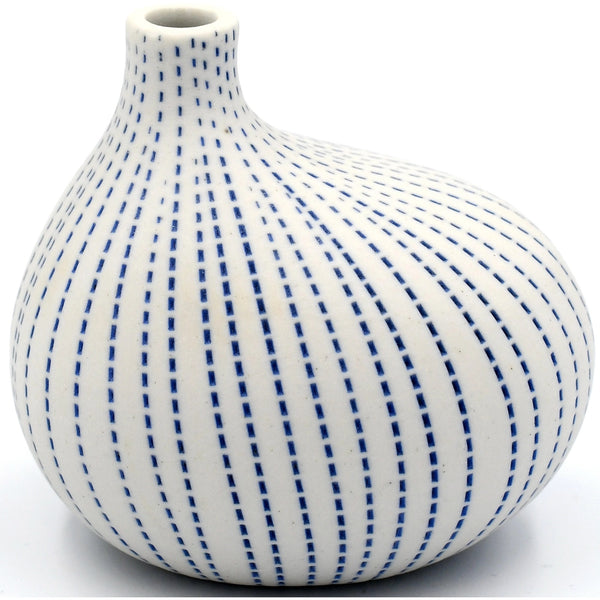Asymmetrical porcelain bud vase with blue stipple stripes available at Cerulean Arts. 