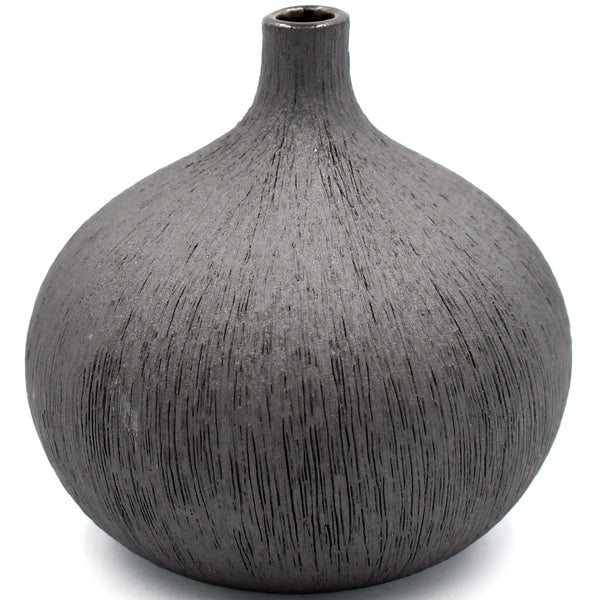 Gourd-shaped porcelain bud vase in matte black with raked design available at Cerulean Arts. 