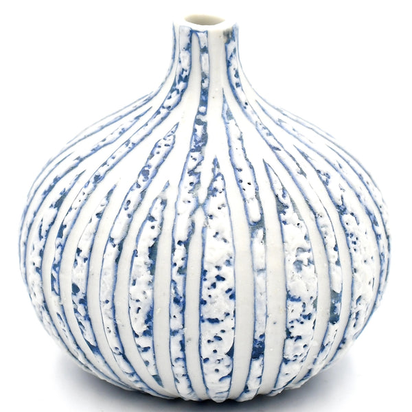 Gourd-shaped porcelain bud vase in mottled blue with carved white stripes available at Cerulean Arts. 