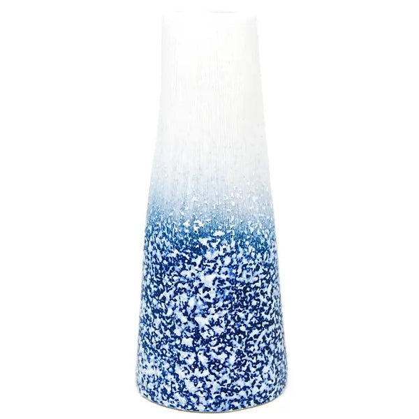 Tall porcelain bud vase with speckled design in blue available at Cerulean Arts.  