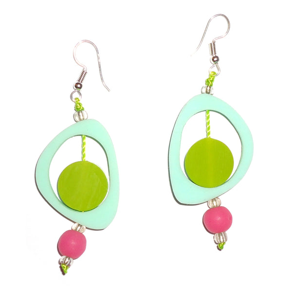 Bold sea green ovoid resin earrings with chartreuse circles, accented with pink beads available at Cerulean Arts. 