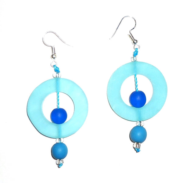 Bold sky blue circular resin earrings with contrasting dark blue beads available at Cerulean Arts. 
