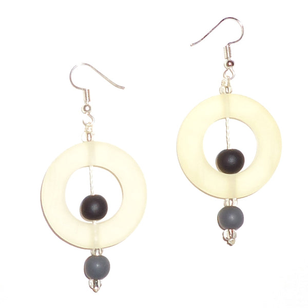 Clear circular resin earrings with contrasting black and gray beads available at Cerulean Arts. 