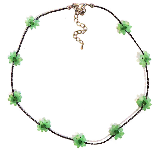 Necklace with green seaglass flowers delicately strung on waxed linen cording available at Cerulean Arts.  