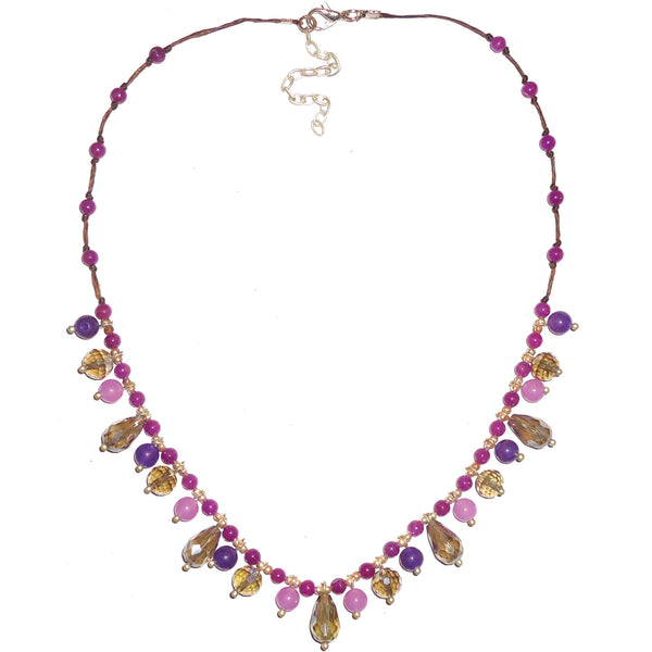 Faceted drop bead necklace in shades of purple on wax linen cording available at Cerulean Arts.  
