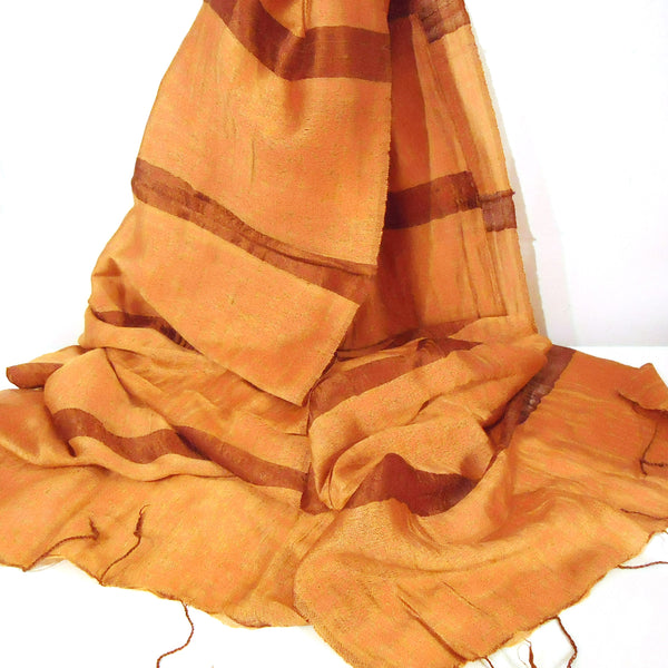 Silk and cotton scarf with iridescent stripe in bronze available at Cerulean Arts.  