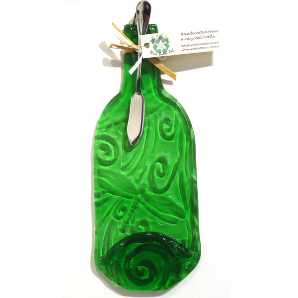 Green glass cheese platter embossed with dragonfly design, made from a recycled wine bottle available at Cerulean Arts.  